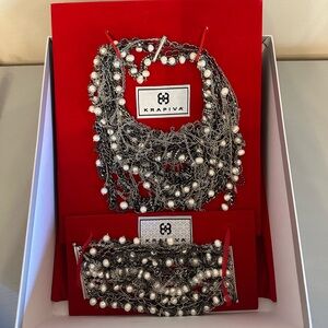 Custom made necklace. Silver with real pearls. Comes as a set with bracelet.